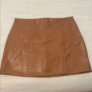 Altar’d State Tan Leather Skirt
Size: M 
Perfect condition, only worn once